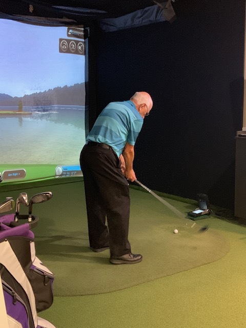 Client at tee from behind.jpg